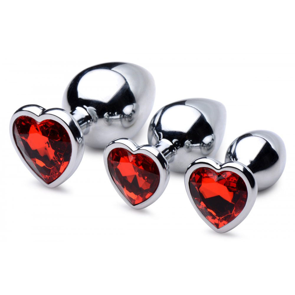 Heart-jeweled metal butt plug set in small, medium and large sizes